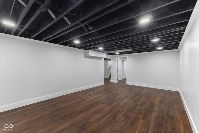 4622 S Franklin Rd, Indianapolis, IN 46239 - finished basement with baseboards and dark wood-style flooring