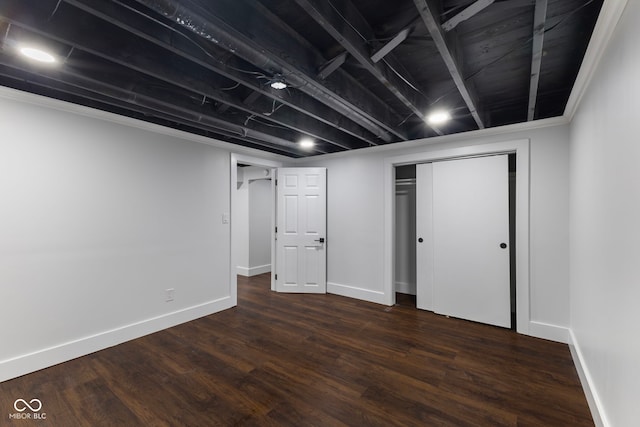 4622 S Franklin Rd, Indianapolis, IN 46239 - finished basement with baseboards and dark wood-style floors