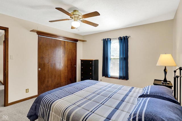 8413 Slippery Elm Ct, Indianapolis, IN 46227 - bedroom with carpet floors, a closet, and a ceiling fan