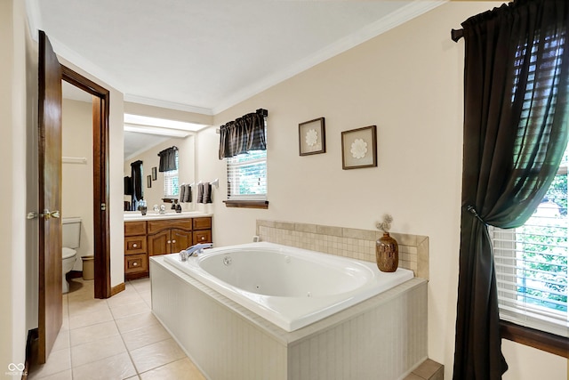 8413 Slippery Elm Ct, Indianapolis, IN 46227 - bathroom featuring a jetted tub, healthy amount of natural light, vanity, tile patterned flooring, and ornamental molding