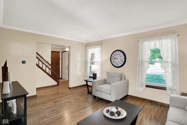 8413 Slippery Elm Ct, Indianapolis, IN 46227 - living room featuring stairway, plenty of natural light, ornamental molding, and wood finished floors