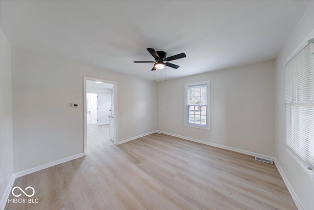 3725 Carson Ave, Indianapolis, IN 46227 - spare room featuring light wood-style floors and ceiling fan