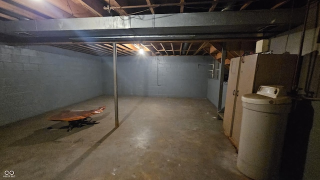 6714 Granner Ct, Indianapolis, IN 46221 - unfinished below grade area with a water softener system