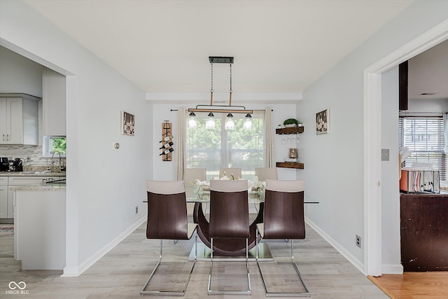 6136 Sandcherry Dr, Indianapolis, IN 46236 - dining space with light wood-style floors and baseboards