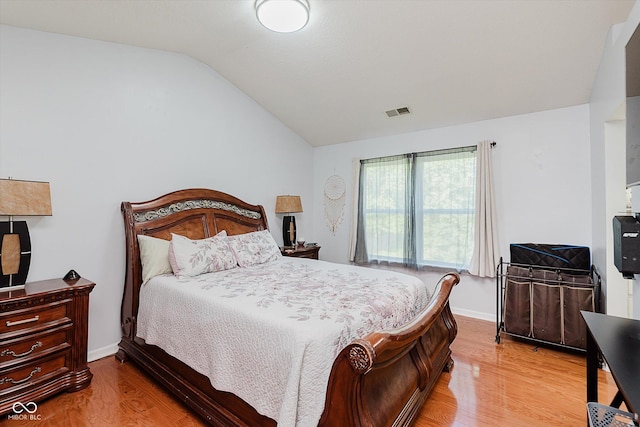 6136 Sandcherry Dr, Indianapolis, IN 46236 - bedroom with lofted ceiling and wood finished floors
