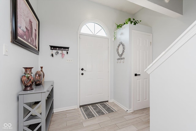 6136 Sandcherry Dr, Indianapolis, IN 46236 - foyer featuring wood finish floors and baseboards