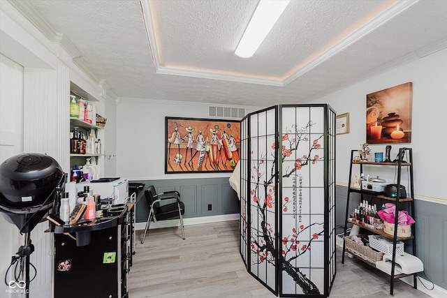 6136 Sandcherry Dr, Indianapolis, IN 46236 - home office with a textured ceiling, wood finished floors, ornamental molding, a decorative wall, and wainscoting