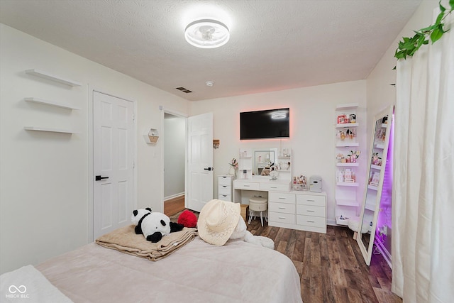 6136 Sandcherry Dr, Indianapolis, IN 46236 - bedroom featuring wood finished floors and a textured ceiling