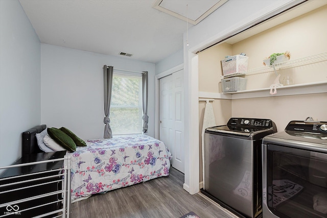 6136 Sandcherry Dr, Indianapolis, IN 46236 - bedroom featuring washer and dryer, attic access, wood finished floors, and a closet
