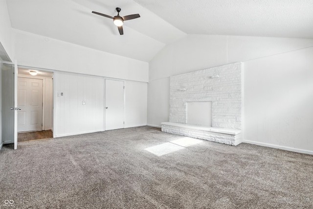 1621 E Kelly St, Indianapolis, IN 46203 - unfurnished living room featuring carpet flooring, a ceiling fan, high vaulted ceiling, and a fireplace