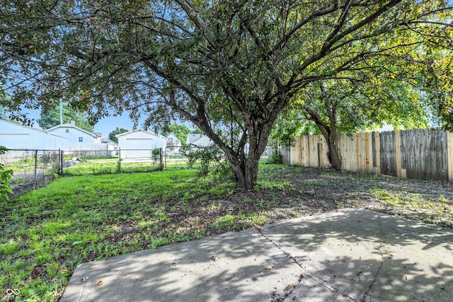 1621 E Kelly St, Indianapolis, IN 46203 - fenced backyard with a patio