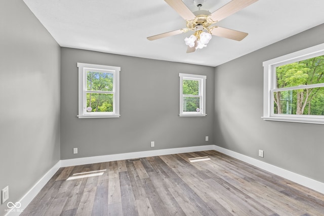 4359 N State Road 75th Hwy, North Salem, IN 46165 - spare room with wood finished floors and a ceiling fan