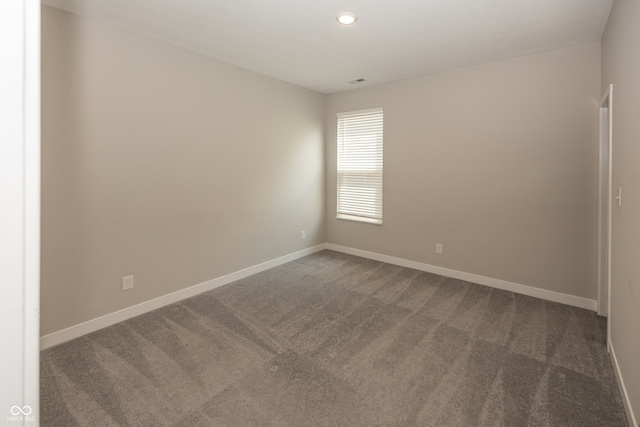 20141 Willenhall Way, Westfield, IN 46074 - unfurnished room with dark carpet and recessed lighting