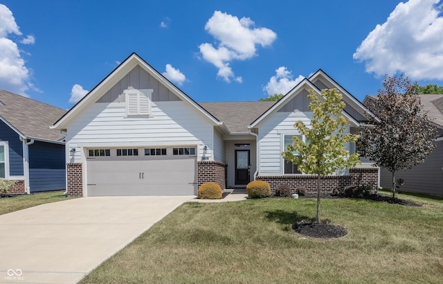20141 Willenhall Way, Westfield, IN 46074 - view of front of home featuring board and batten siding, brick siding, concrete driveway, a front lawn, and an attached garage