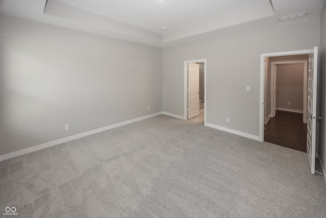 20141 Willenhall Way, Westfield, IN 46074 - unfurnished bedroom featuring a raised ceiling and carpet