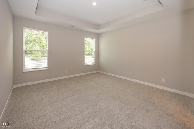 20141 Willenhall Way, Westfield, IN 46074 - spare room with a tray ceiling, light colored carpet, and recessed lighting