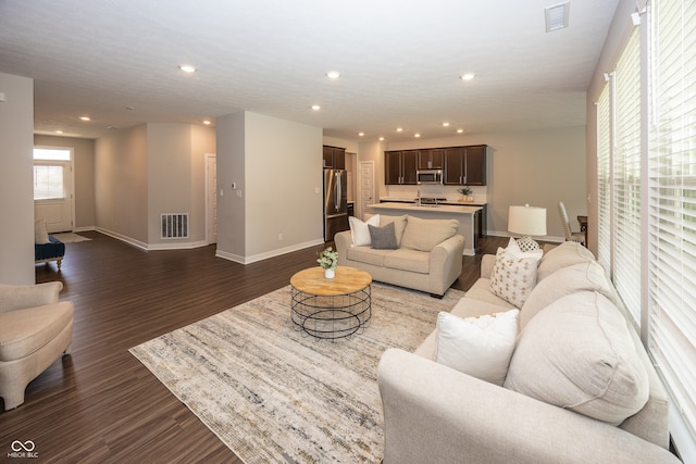 20141 Willenhall Way, Westfield, IN 46074 - living room featuring dark wood-style flooring and recessed lighting