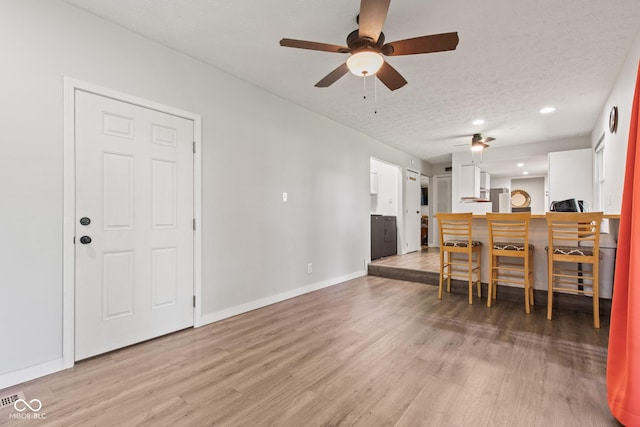 296 Summit Ridge Dr, Greenwood, IN 46142 - living room with ceiling fan, light wood-type flooring, and recessed lighting