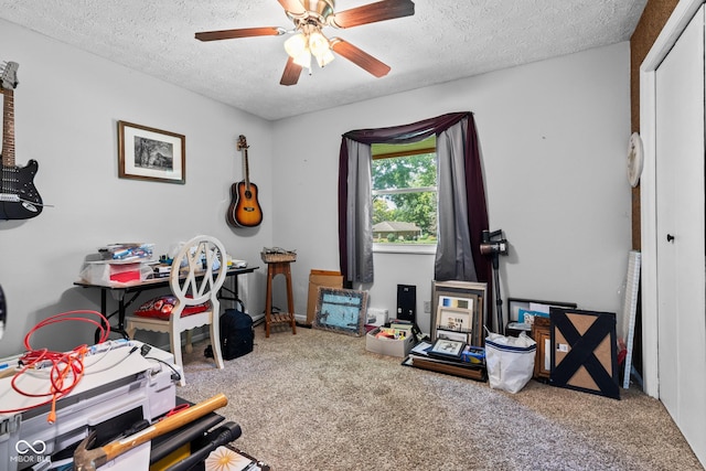296 Summit Ridge Dr, Greenwood, IN 46142 - home office with a textured ceiling, carpet flooring, and a ceiling fan