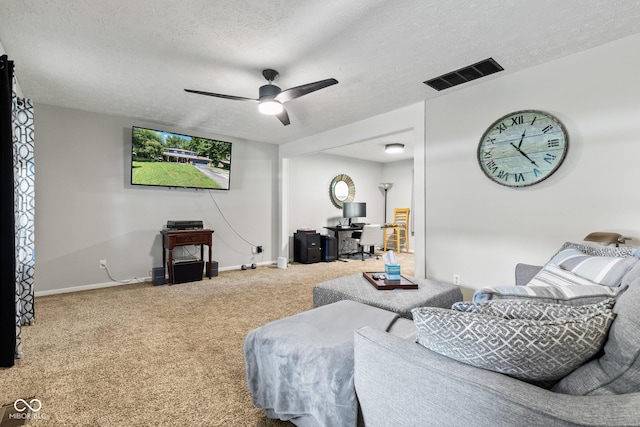 296 Summit Ridge Dr, Greenwood, IN 46142 - carpeted living area with ceiling fan, a textured ceiling, and a desk
