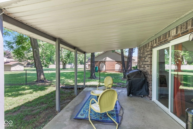 296 Summit Ridge Dr, Greenwood, IN 46142 - fenced backyard featuring a grill and a patio area