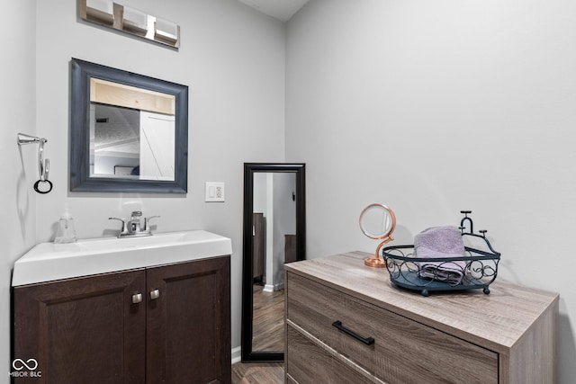 296 Summit Ridge Dr, Greenwood, IN 46142 - bathroom featuring vanity and wood finished floors
