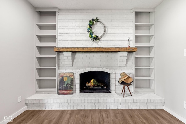 296 Summit Ridge Dr, Greenwood, IN 46142 - detailed view of wood finished floors and a fireplace