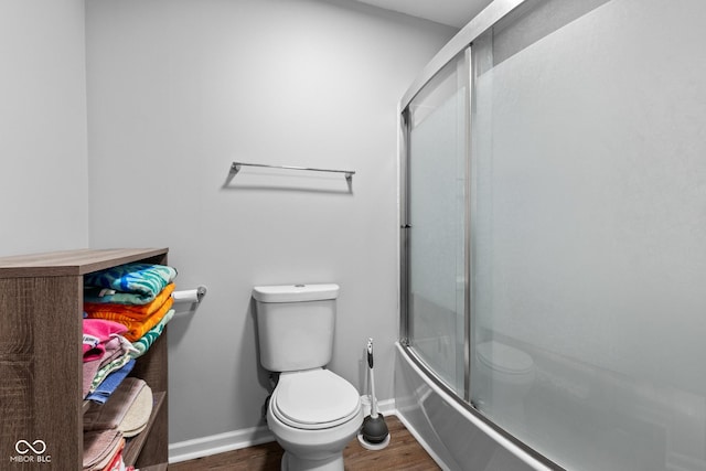 296 Summit Ridge Dr, Greenwood, IN 46142 - full bath with wood finished floors and combined bath / shower with glass door