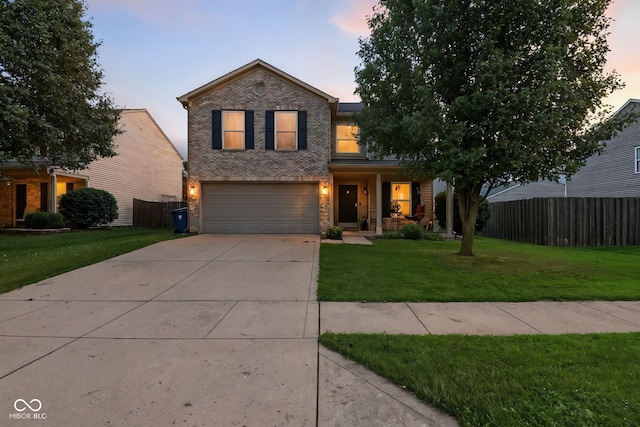 8147 Retreat Ln, Indianapolis, IN 46259 - traditional-style home featuring an attached garage, concrete driveway, a porch, and brick siding