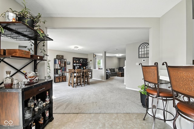 8147 Retreat Ln, Indianapolis, IN 46259 - dining room with light carpet and baseboards