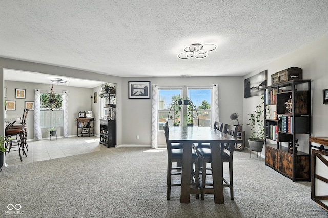 8147 Retreat Ln, Indianapolis, IN 46259 - carpeted dining area with a textured ceiling