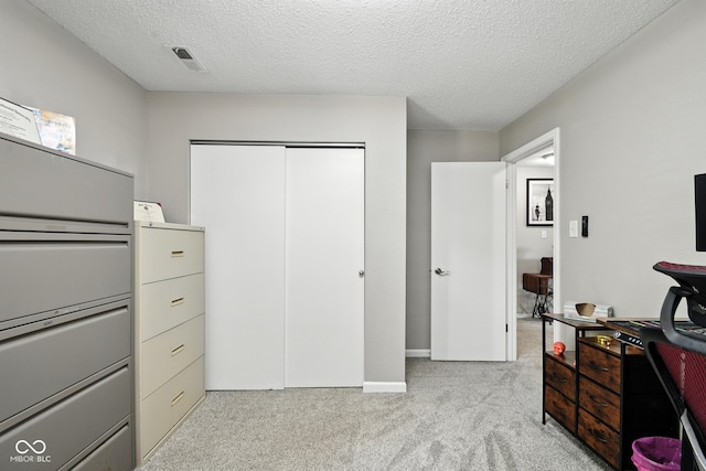 8147 Retreat Ln, Indianapolis, IN 46259 - bedroom with carpet, a closet, and a textured ceiling