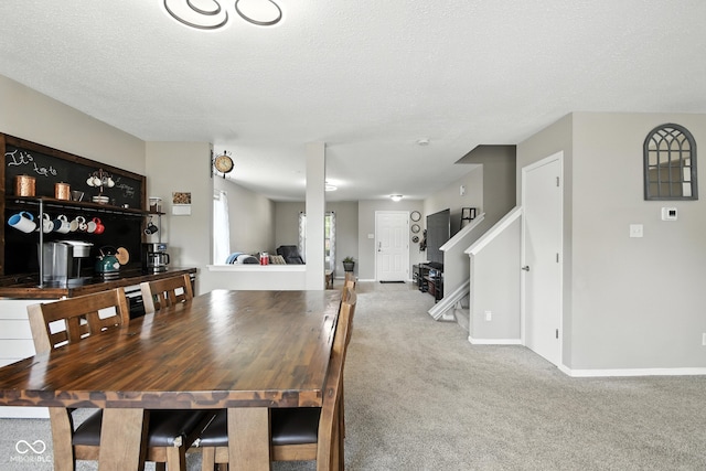 8147 Retreat Ln, Indianapolis, IN 46259 - carpeted dining room featuring a textured ceiling and stairs