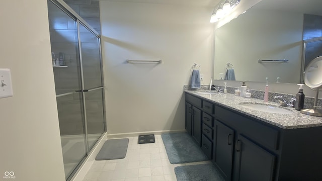 4081 Lotus St, Plainfield, IN 46168 - full bath with double vanity, tile patterned flooring, and a shower with shower door
