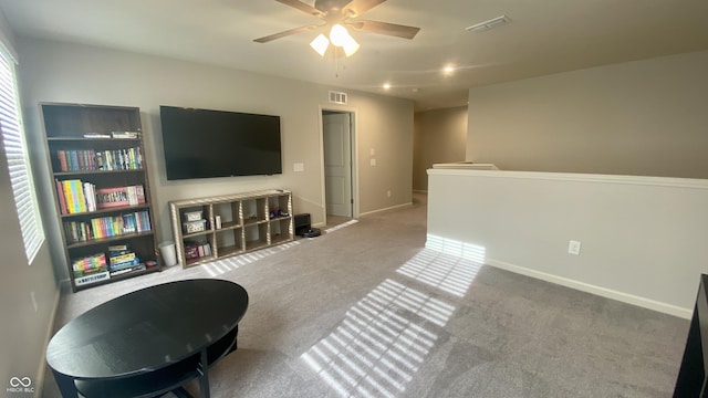 4081 Lotus St, Plainfield, IN 46168 - sitting room with a ceiling fan, carpet flooring, and an upstairs landing