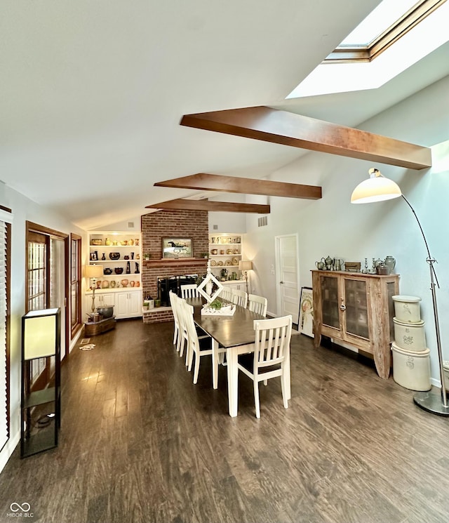 401 Dellwood Dr, Covington, IN 47932 - dining room featuring dark wood-style floors, a skylight, a fireplace, and built in features