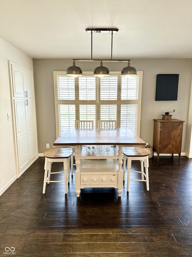 401 Dellwood Dr, Covington, IN 47932 - dining area with dark wood finished floors and baseboards