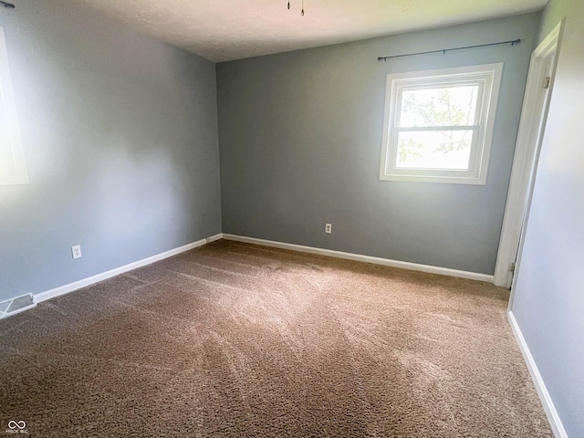 3911 Eastwind St, Indianapolis, IN 46237 - carpeted spare room featuring baseboards