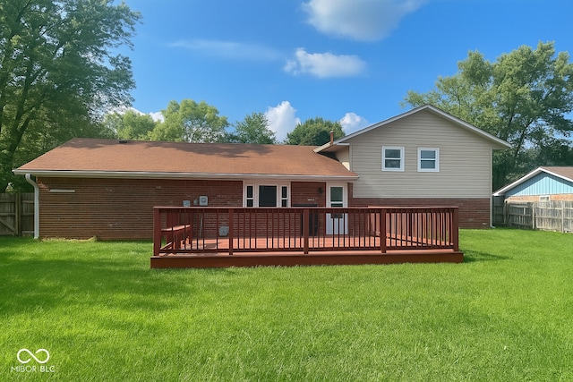 3911 Eastwind St, Indianapolis, IN 46237 - back of property featuring brick siding and a wooden deck