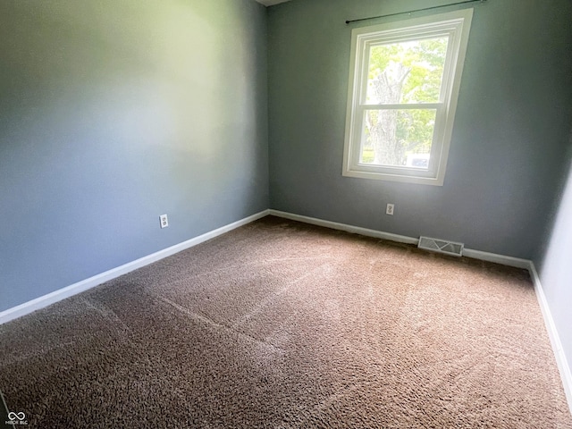 3911 Eastwind St, Indianapolis, IN 46237 - empty room featuring carpet flooring