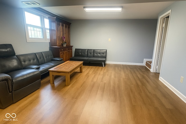 3911 Eastwind St, Indianapolis, IN 46237 - living area featuring light wood finished floors and baseboards
