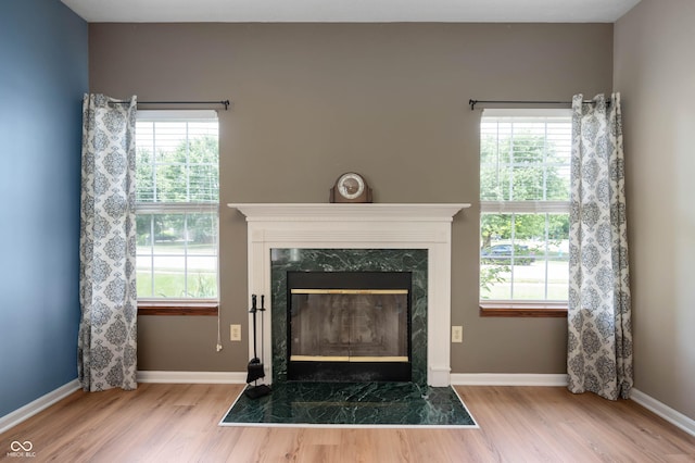 8365 Captain Dr, Avon, IN 46123 - detailed view of wood finished floors and a fireplace