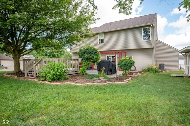 8365 Captain Dr, Avon, IN 46123 - back of property featuring a wooden deck and a lawn