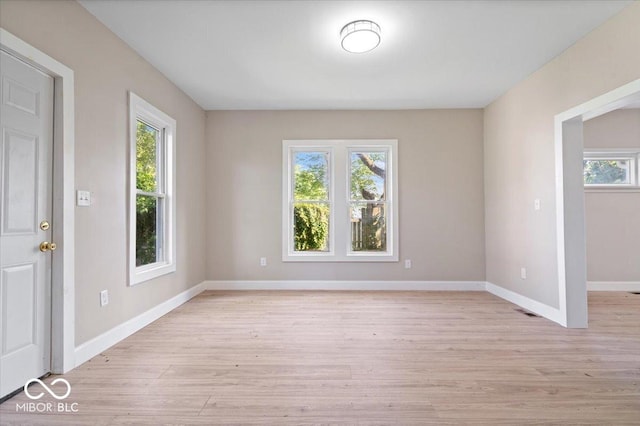 2813 S Monroe St, Muncie, IN 47302 - unfurnished room with light wood finished floors and baseboards