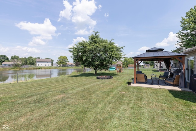 2082 Fiesbeck Dr, Columbus, IN 47201 - view of yard with a gazebo, a water view, and a fire pit