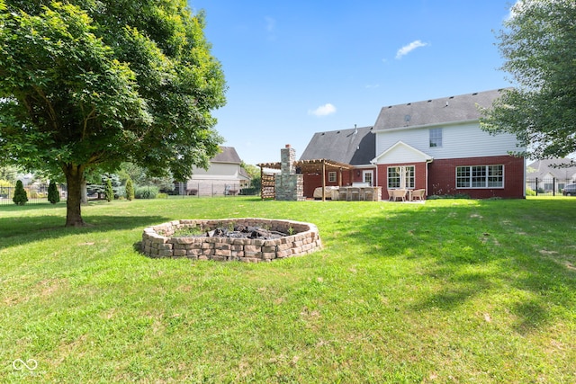 5910 Hickory Woods Dr, Plainfield, IN 46168 - view of yard with an outdoor fire pit, a patio area, and a pergola