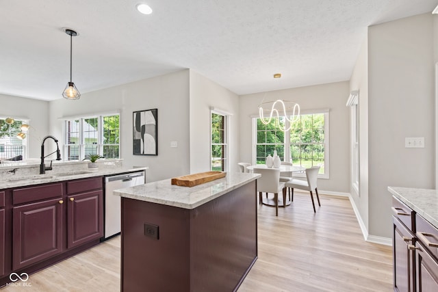 5910 Hickory Woods Dr, Plainfield, IN 46168 - kitchen featuring dishwasher, plenty of natural light, and decorative light fixtures