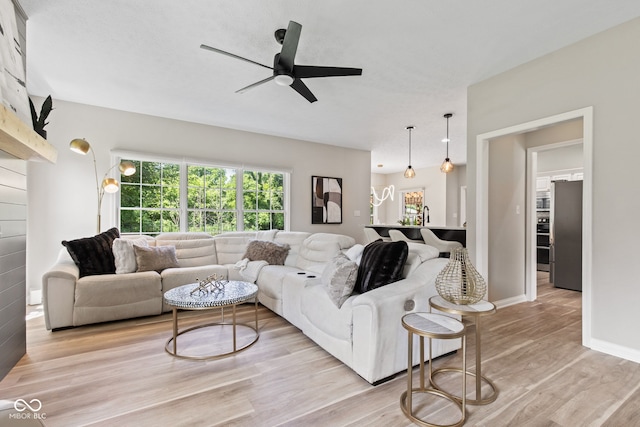 5910 Hickory Woods Dr, Plainfield, IN 46168 - living room with light wood-style flooring and ceiling fan