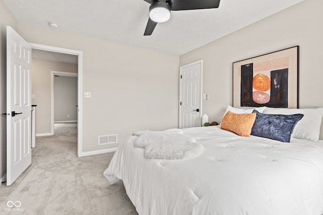 5910 Hickory Woods Dr, Plainfield, IN 46168 - bedroom with light carpet and ceiling fan