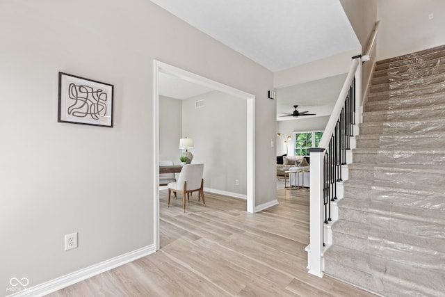 5910 Hickory Woods Dr, Plainfield, IN 46168 - entrance foyer featuring stairs, light wood-style floors, and a ceiling fan